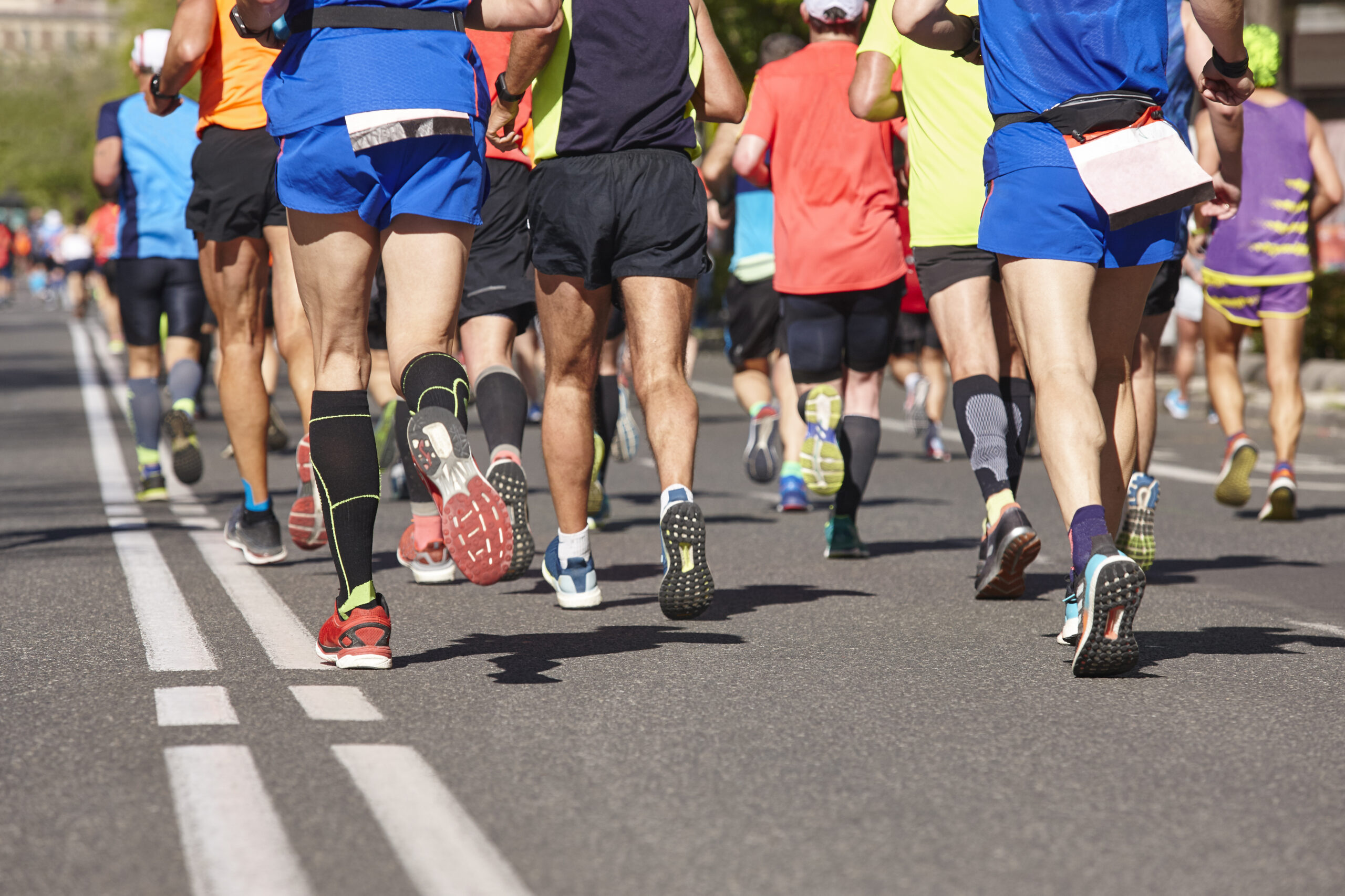 Marathon runners on the street Healthy lifestyle Athletes
