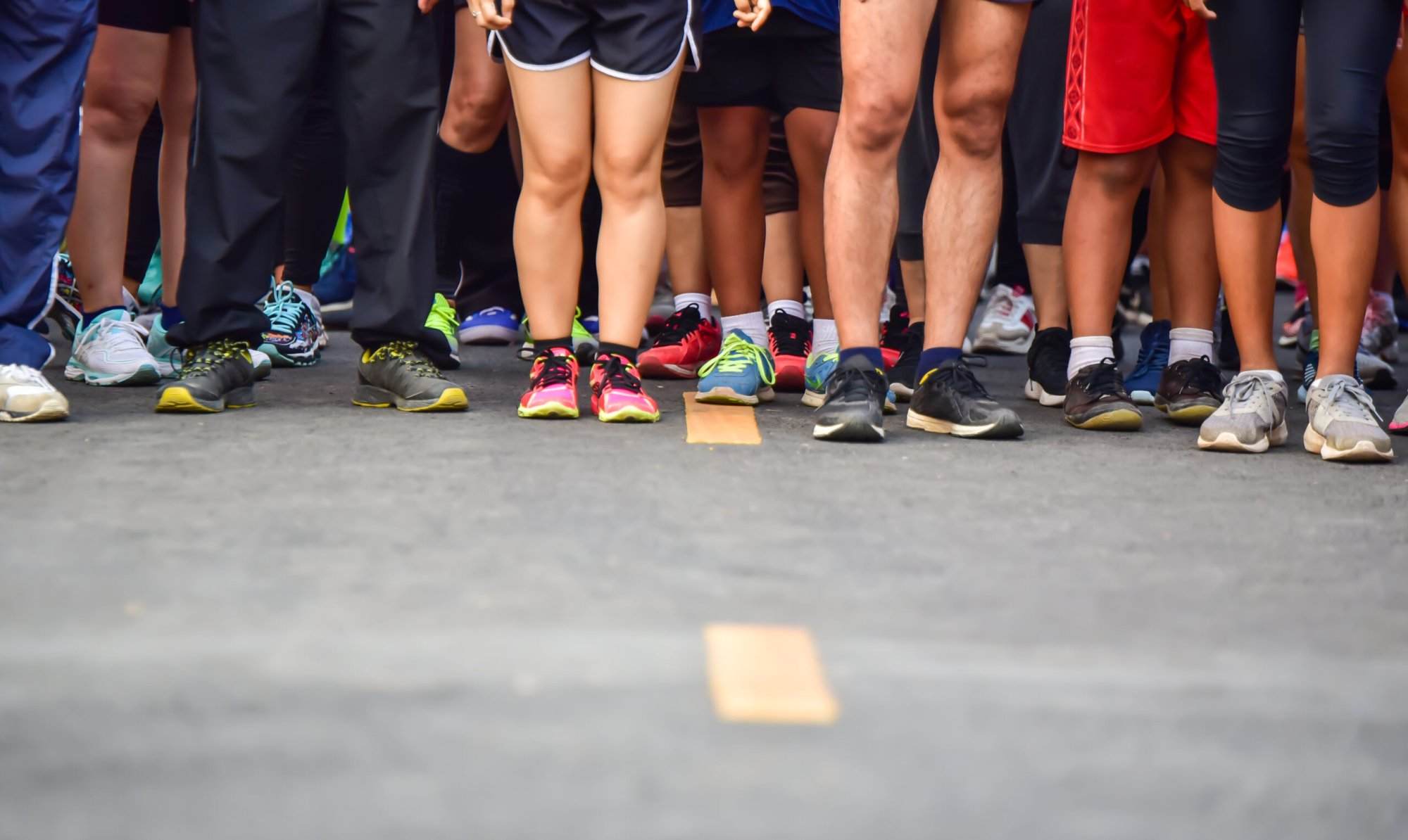 A group of people planning their race strategy together.