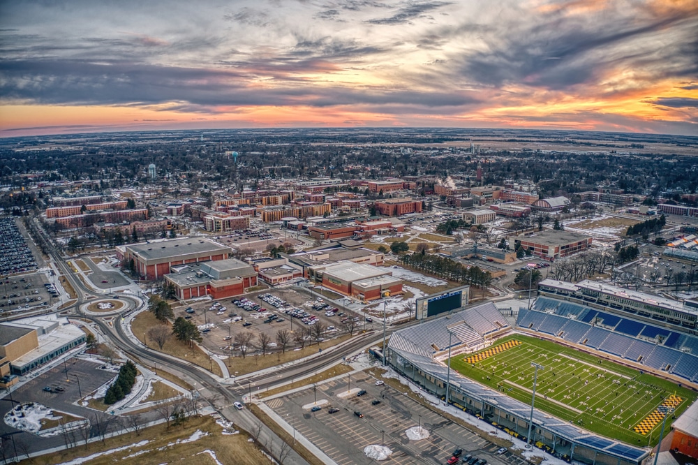 An aerial view of a football field at sunset.